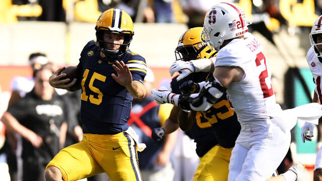 BERKELEY, CALIFORNIA - NOVEMBER 23: Fernando Mendoza #15 of the California Golden Bears runs against the Stanford Cardinal in the second quarter at California Memorial Stadium on November 23, 2024 in Berkeley, California.