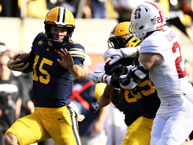 BERKELEY, CALIFORNIA - NOVEMBER 23: Fernando Mendoza #15 of the California Golden Bears runs against the Stanford Cardinal in the second quarter at California Memorial Stadium on November 23, 2024 in Berkeley, California.