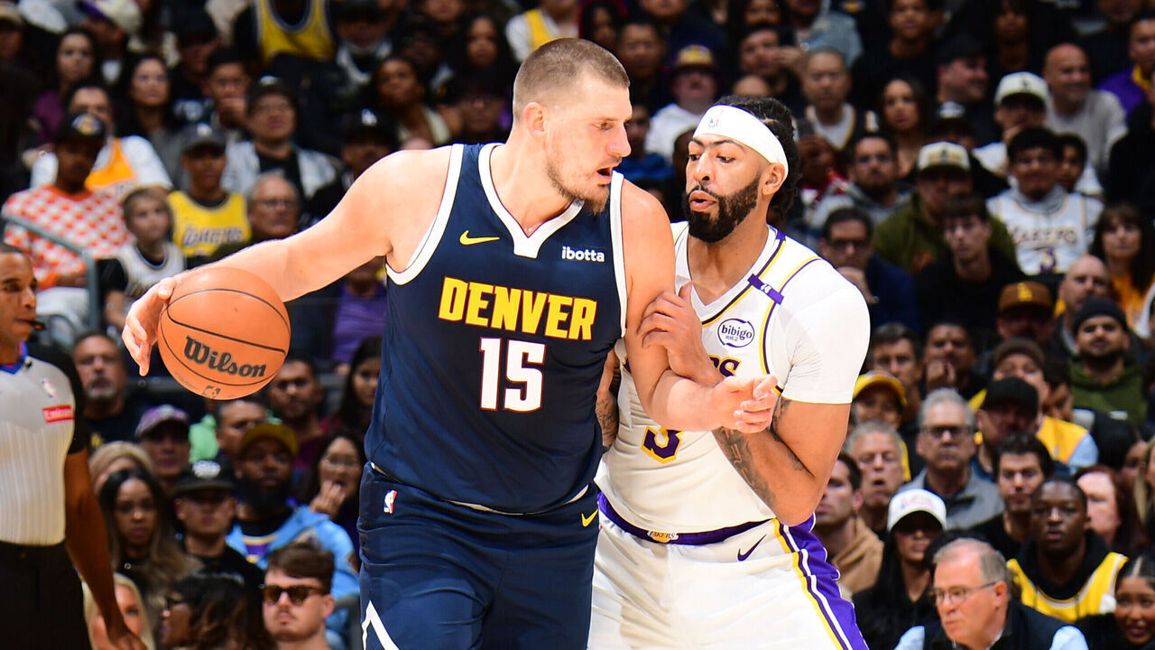 LOS ANGELES, CA - NOVEMBER 23: Nikola Jokic #15 of the Denver Nuggets dribbles the ball during the game against the Los Angeles Lakers on November 23, 2024 at Crypto.Com Arena in Los Angeles, California. NOTE TO USER: User expressly acknowledges and agrees that, by downloading and/or using this Photograph, user is consenting to the terms and conditions of the Getty Images License Agreement. Mandatory Copyright Notice: Copyright 2024 NBAE