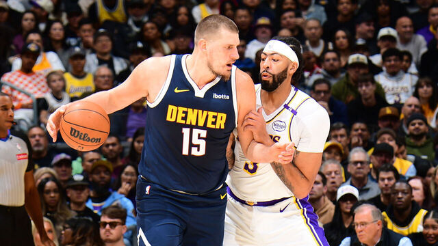 LOS ANGELES, CA - NOVEMBER 23: Nikola Jokic #15 of the Denver Nuggets dribbles the ball during the game against the Los Angeles Lakers on November 23, 2024 at Crypto.Com Arena in Los Angeles, California. NOTE TO USER: User expressly acknowledges and agrees that, by downloading and/or using this Photograph, user is consenting to the terms and conditions of the Getty Images License Agreement. Mandatory Copyright Notice: Copyright 2024 NBAE
