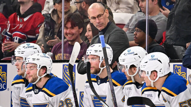 MONTREAL, CANADA - FEBRUARY 11: Interim head coach of the St. Louis Blues Drew Bannister, handles bench duties during the second period against the Montreal Canadiens at the Bell Centre on February 11, 2024 in Montreal, Quebec, Canada. The St. Louis Blues defeated the Montreal Canadiens 7-2.