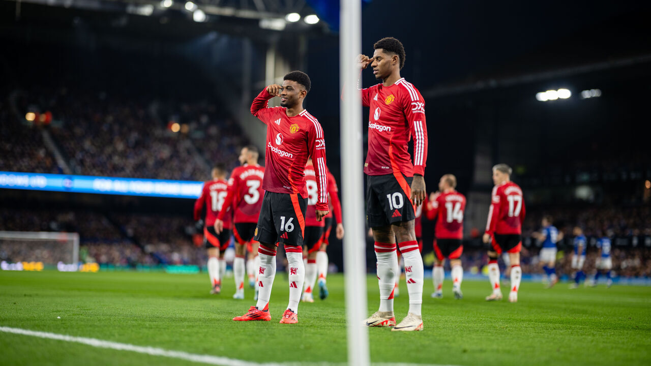 IPSWICH, ENGLAND - NOVEMBER 24: Marcus Rashford of Manchester United celebrates scoring a goal to make the score 0-1 wit Amad (L) during the Premier League match between Ipswich Town FC and Manchester United FC at Portman Road on November 24, 2024 in Ipswich, United Kingdom.