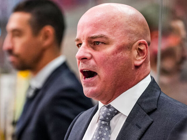 RALEIGH, NORTH CAROLINA - OCTOBER 31: Head coach Jim Montgomery of the Boston Bruins looks on during the second period against the Carolina Hurricanes at Lenovo Center on October 31, 2024 in Raleigh, North Carolina.