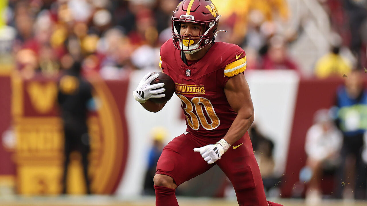 LANDOVER, MARYLAND - NOVEMBER 10: Austin Ekeler #30 of the Washington Commanders runs the ball in the second quarter of a game against the Pittsburgh Steelers at Northwest Stadium on November 10, 2024 in Landover, Maryland.