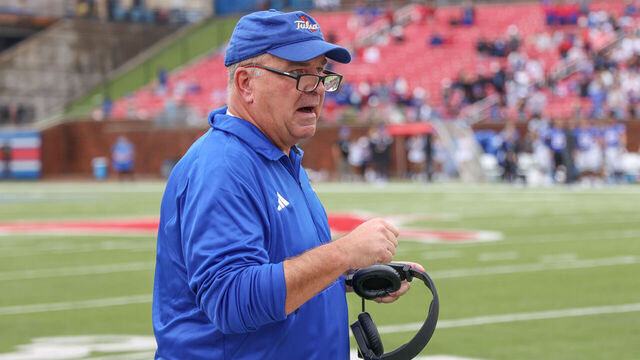 DALLAS, TX - OCTOBER 28: Tulsa Golden Hurricane head coach Kevin Wilson talks to an official during the game between the Tulsa Golden Hurricane and SMU Mustangs on October 28, 2023 at Gerald J. Ford Stadium in Dallas, TX.