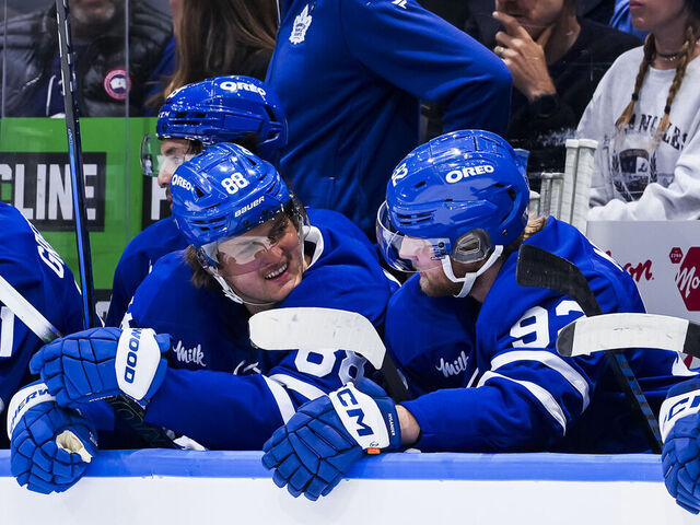 TORONTO, ON - NOVEMBER 24: William Nylander #88 and Alex Nylander interact on the bench during the first period against the Utah Hockey Club at the Scotiabank Arena on November 24, 2024 in Toronto, Ontario, Canada.