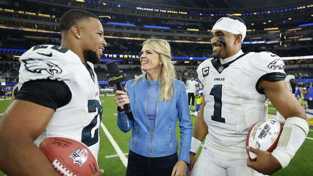 INGLEWOOD, CALIFORNIA - NOVEMBER 24: Saquon Barkley #26 and Jalen Hurts #1 of the Philadelphia Eagles are interviewed after a 37-20 victory against the Los Angeles Rams at SoFi Stadium on November 24, 2024 in Inglewood, California.