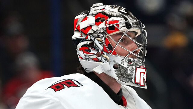 COLUMBUS, OHIO - NOVEMBER 23: Detailed look at Pyotr Kochetkov #52 of the Carolina Hurricanes mask worn during the game against the Columbus Blue Jackets at Nationwide Arena on November 23, 2024 in Columbus, Ohio.