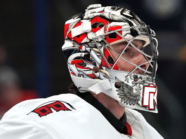 COLUMBUS, OHIO - NOVEMBER 23: Detailed look at Pyotr Kochetkov #52 of the Carolina Hurricanes mask worn during the game against the Columbus Blue Jackets at Nationwide Arena on November 23, 2024 in Columbus, Ohio.