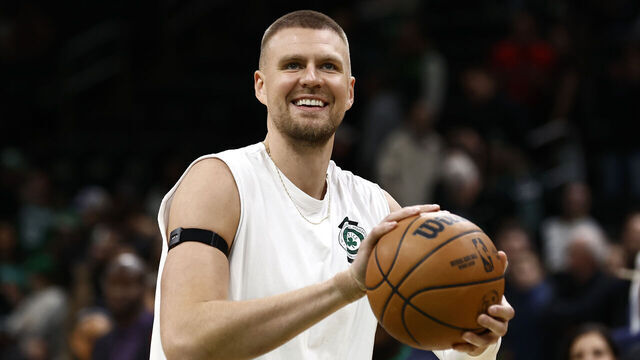 BOSTON, MA - NOVEMBER 16: Kristaps Porzingis #8 of the Boston Celtics smiles as he warms up before the game between the Boston Celtics and the Toronto Raptors at TD Garden on November 16, 2024 in Boston, Massachusetts. NOTE TO USER: User expressly acknowledges and agrees that, by downloading and/or using this Photograph, user is consenting to the terms and conditions of the Getty Images License Agreement.
