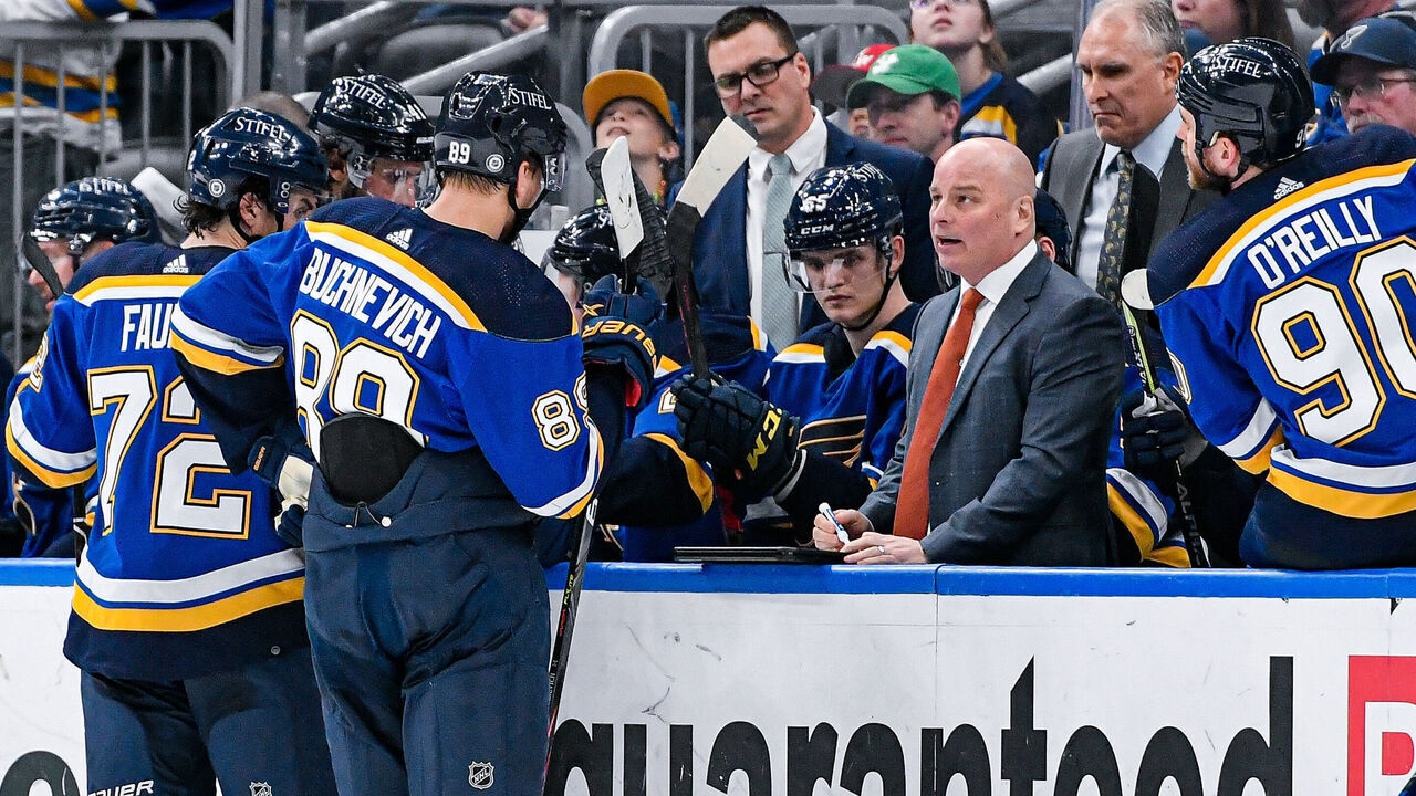 ST. LOUIS, MO - MARCH 17: St. Louis Blues coach Jim Montgomery goes over strategy for the penalty kill during a time out in a game between the Pittsburgh Penguins and the St. Louis Blues on March 17, 2022, at the Enterprise Center in St. Louis MO