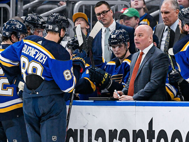 ST. LOUIS, MO - MARCH 17: St. Louis Blues coach Jim Montgomery goes over strategy for the penalty kill during a time out in a game between the Pittsburgh Penguins and the St. Louis Blues on March 17, 2022, at the Enterprise Center in St. Louis MO