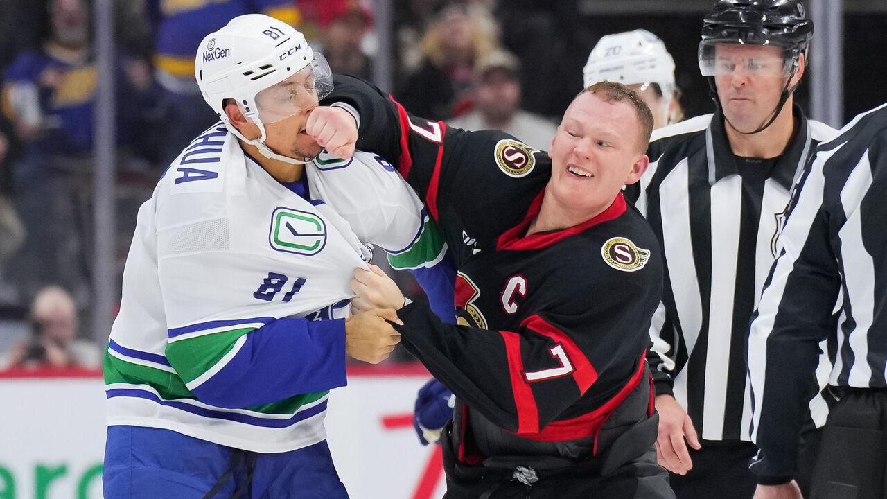OTTAWA, CANADA - NOVEMBER 23: Brady Tkachuk #7 of the Ottawa Senators fights Dakota Joshua #81 of the Vancouver Canucks during the third period at Canadian Tire Centre on November 23, 2024 in Ottawa, Ontario, Canada.