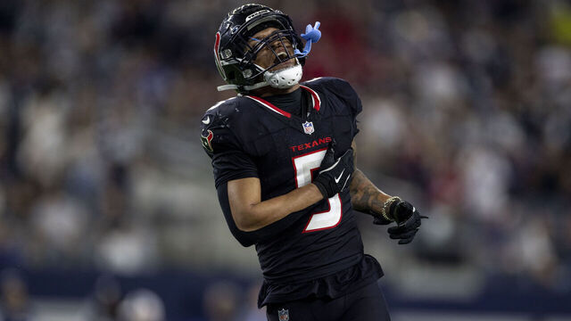 ARLINGTON, TEXAS - NOVEMBER 18: Jalen Pitre #5 of the Houston Texans reacts during an NFL Football game against the Dallas Cowboys at AT&T Stadium on November 18, 2024 in Arlington, Texas.