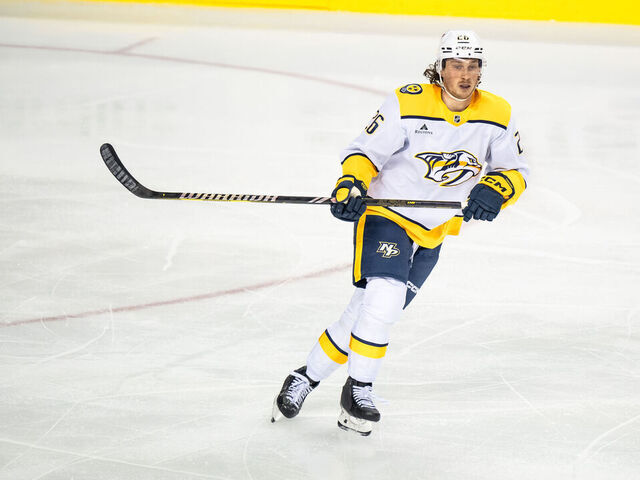 CALGARY, AB - NOVEMBER 15: Nashville Predators center Philip Tomasino (26) skates during the first period of an NHL game between the Calgary Flames and the Nashville Predators on November 15, 2024, at the Scotiabank Saddledome in Calgary, AB.
