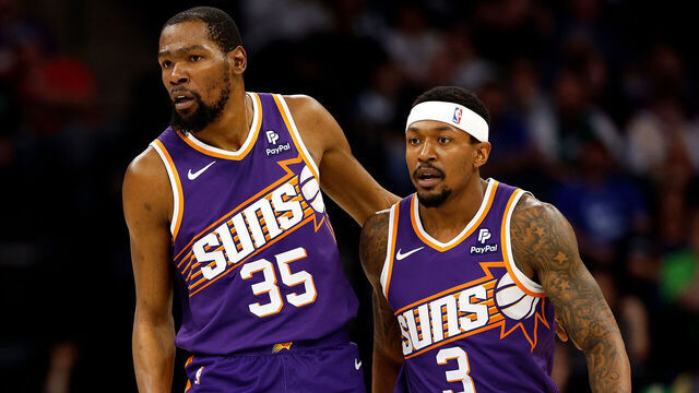 MINNEAPOLIS, MINNESOTA - APRIL 14: Kevin Durant #35 and Bradley Beal #3 of the Phoenix Suns look on against the Minnesota Timberwolves in the first quarter at Target Center on April 14, 2024 in Minneapolis, Minnesota. The Suns defeated the Timberwolves 125-106.