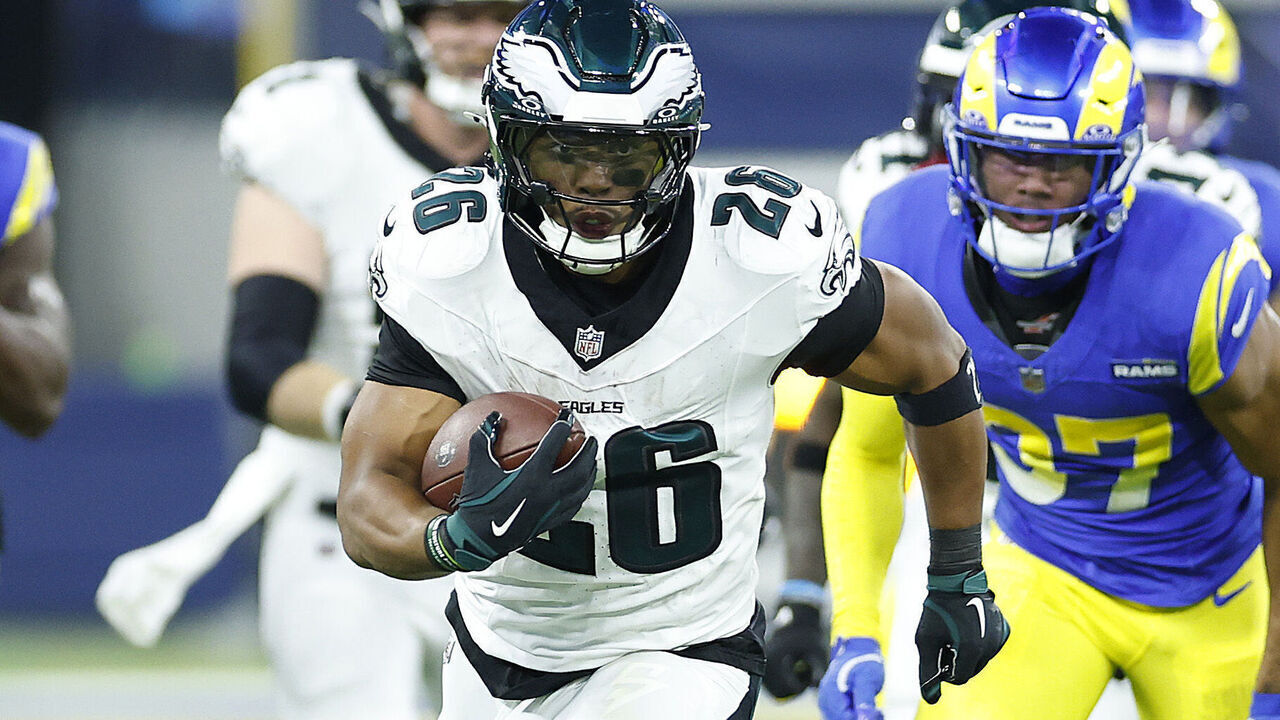 INGLEWOOD, CALIFORNIA - NOVEMBER 24: Saquon Barkley #26 of the Philadelphia Eagles runs for a touchdown during the third quarter against the Los Angeles Rams at SoFi Stadium on November 24, 2024 in Inglewood, California.