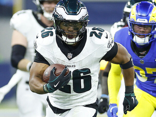 INGLEWOOD, CALIFORNIA - NOVEMBER 24: Saquon Barkley #26 of the Philadelphia Eagles runs for a touchdown during the third quarter against the Los Angeles Rams at SoFi Stadium on November 24, 2024 in Inglewood, California.