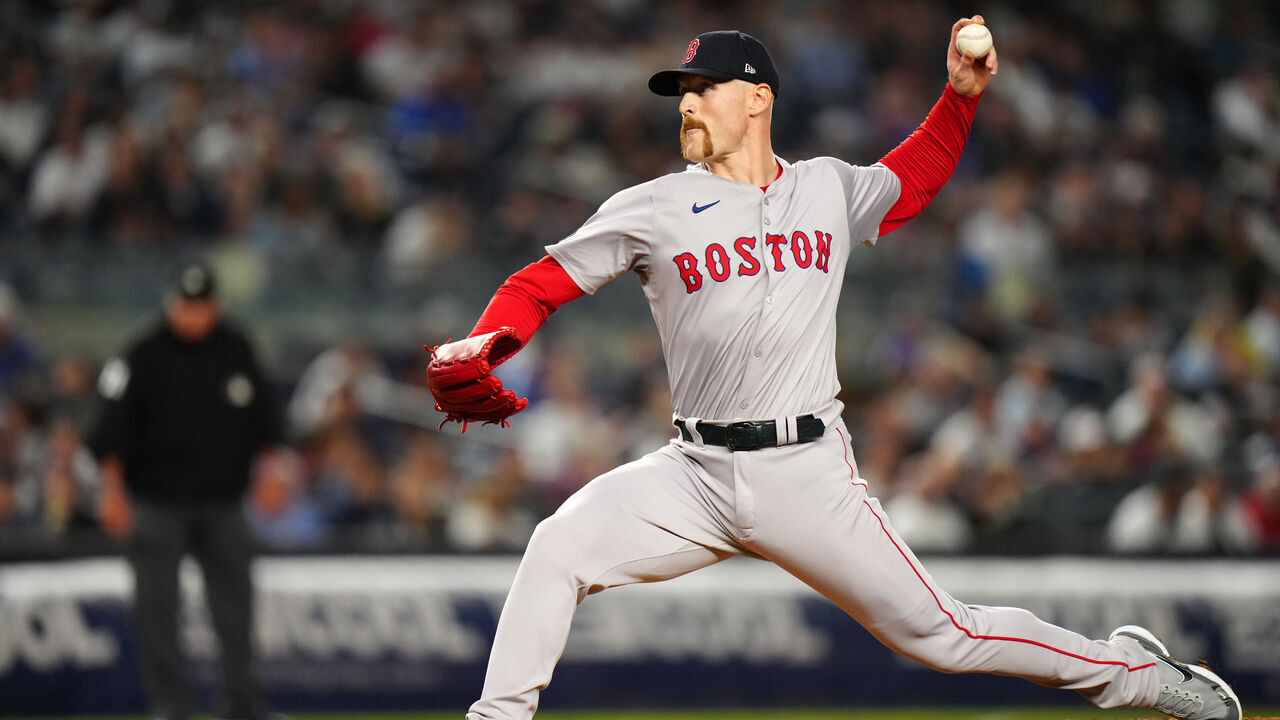 NEW YORK, NY - SEPTEMBER 12: Cam Booser #71 of the Boston Red Sox pitches during the game between the Boston Red Sox and the New York Yankees at Yankee Stadium on Thursday, September 12, 2024 in New York, New York.