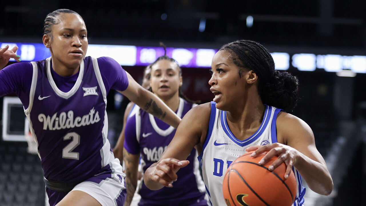 HENDERSON, NEVADA - NOVEMBER 25: Ashlon Jackson #3 of the Duke Blue Devils drives against Temira Poindexter #2 of the Kansas State Wildcats in the second quarter of a game at Lee's Family Forum on November 25, 2024 in Henderson, Nevada.
