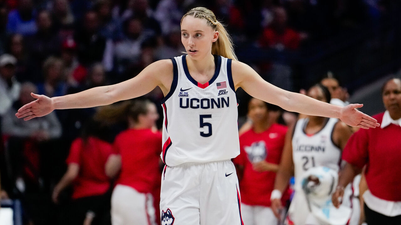STORRS, CONNECTICUT - NOVEMBER 20: Paige Bueckers #5 of the Connecticut Huskies cheers on her teammates during the first half of an NCAA women's basketball game against the Fairleigh Dickinson Knights at the Harry A. Gampel Pavilion on November 20, 2024 in Storrs, Connecticut.