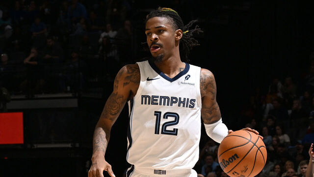 MEMPHIS, TN - NOVEMBER 25: Ja Morant #12 of the Memphis Grizzlies dribbles the ball during the game against the Portland Trail Blazers on November 25, 2024 at FedExForum in Memphis, Tennessee. Mandatory Copyright Notice: Copyright 2024 NBAE