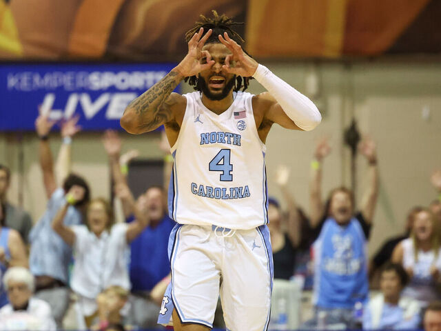 LAHAINA, HAWAII - NOVEMBER 25: RJ Davis #4 of the North Carolina Tar Heels celebrates after hitting a three point shot during the second half of the Maui Invitational against the Dayton Flyers at the Lahaina Civic Center on November 25, 2024 in Lahaina, Hawaii.