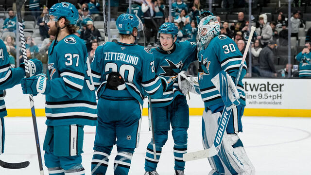 SAN JOSE, CALIFORNIA - NOVEMBER 25: Yaroslav Askarov #30 of the San Jose Sharks celebrates his first win with the Sharks against the Los Angeles Kings at SAP Center on November 25, 2024 in San Jose, California.