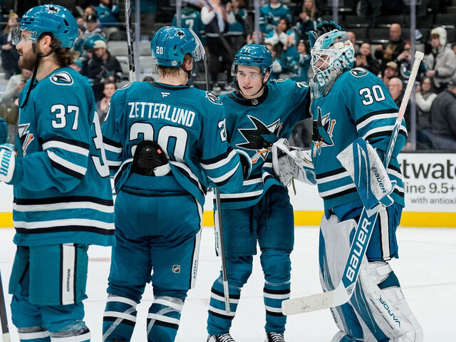 SAN JOSE, CALIFORNIA - NOVEMBER 25: Yaroslav Askarov #30 of the San Jose Sharks celebrates his first win with the Sharks against the Los Angeles Kings at SAP Center on November 25, 2024 in San Jose, California.
