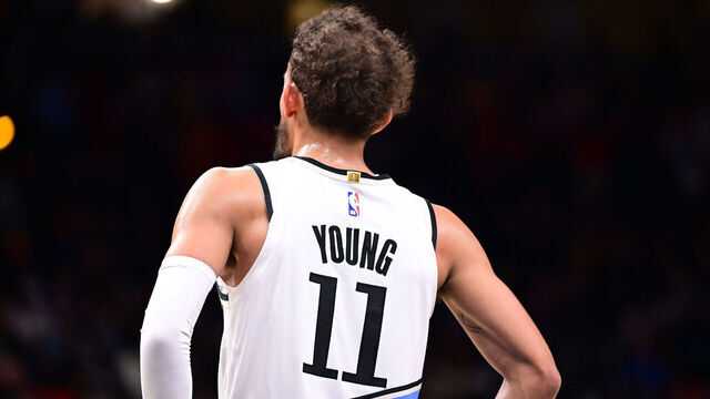 ATLANTA, GA - NOVEMBER 25: Trae Young #11 of the Atlanta Hawks looks on during the game against the Dallas Mavericks on November 25, 2024 at State Farm Arena in Atlanta, Georgia. NOTE TO USER: User expressly acknowledges and agrees that, by downloading and/or using this Photograph, user is consenting to the terms and conditions of the Getty Images License Agreement. Mandatory Copyright Notice: Copyright 2024 NBAE