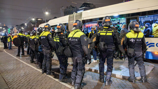Dutch mobile Police officers stand guard after several scuffles broke out in the city center following the UEFA Europa League, League phase - Matchday 4, football match between Ajax Amsterdam and Maccabi Tel Aviv, in Amsterdam on November 8, 2024. Dutch Prime Minister Dick Schoof described "anti-Semitic attacks on Israelis" in Amsterdam as "unacceptable", in a message posted on his X account.