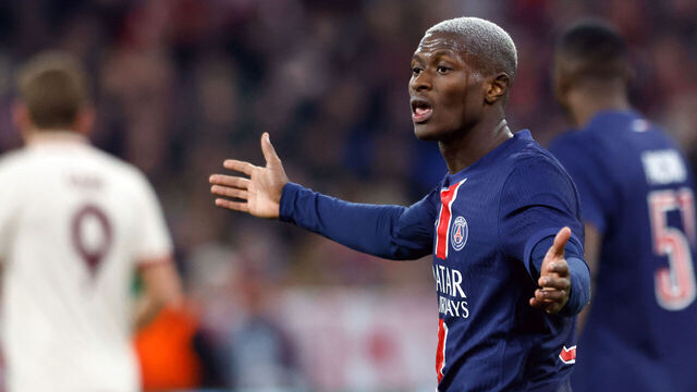 Paris Saint-Germain's Portuguese defender #25 Nuno Mendes reacts during the UEFA Champions League football match FC Bayern Munich vs Paris Saint-Germain in Munich, southern Germany, on November 26, 2024.