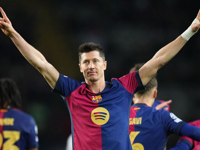 BARCELONA, SPAIN - NOVEMBER 26: Robert Lewandowski of FC Barcelona celebrates scoring his team's third goal during the UEFA Champions League 2024/25 League Phase MD5 match between FC Barcelona and Stade Brestois 29 at Estadi Olimpic Lluis Companys on November 26, 2024 in Barcelona, Spain.