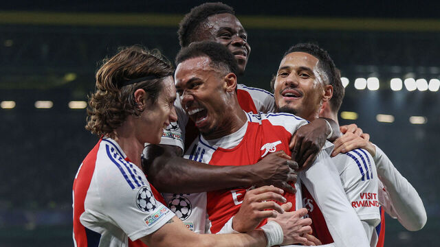 Arsenal's Brazilian defender #06 Gabriel Magalhaes (C) celebrates with teammates after scoring their third goal during the UEFA Champions League, league phase day 5 football match between Sporting CP and Arsenal FC, at the Jose Alvalade stadium in Lisbon, on November 26, 2024.