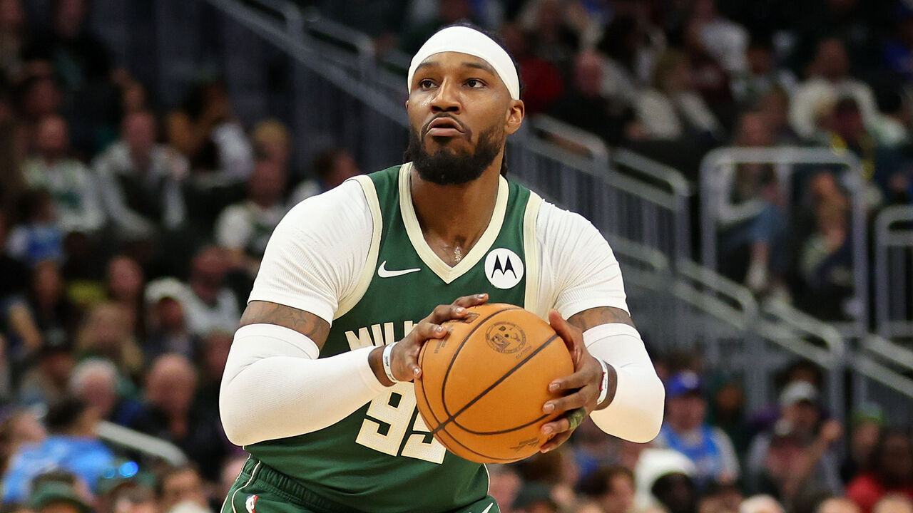 MILWAUKEE, WISCONSIN - APRIL 10: Jae Crowder #99 of the Milwaukee Bucks takes a shot during a game against the Orlando Magic at Fiserv Forum on April 10, 2024 in Milwaukee, Wisconsin.