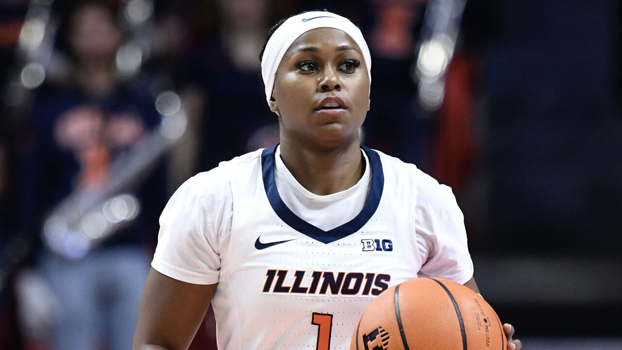 CHAMPAIGN, IL - NOVEMBER 22: Illinois Fighting Illini Guard Genesis Bryant (1) dribbles during the women's college basketball game between the Oregon State Beavers and the Illinois Fighting Illini on November 22, 2024, at State Farm Center in Champaign, Illinois.