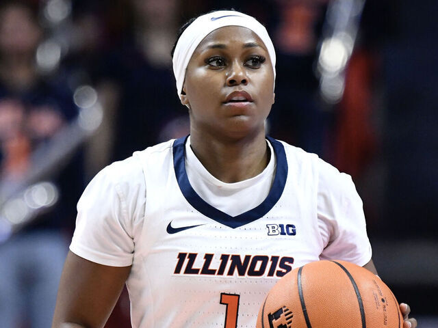 CHAMPAIGN, IL - NOVEMBER 22: Illinois Fighting Illini Guard Genesis Bryant (1) dribbles during the women's college basketball game between the Oregon State Beavers and the Illinois Fighting Illini on November 22, 2024, at State Farm Center in Champaign, Illinois.