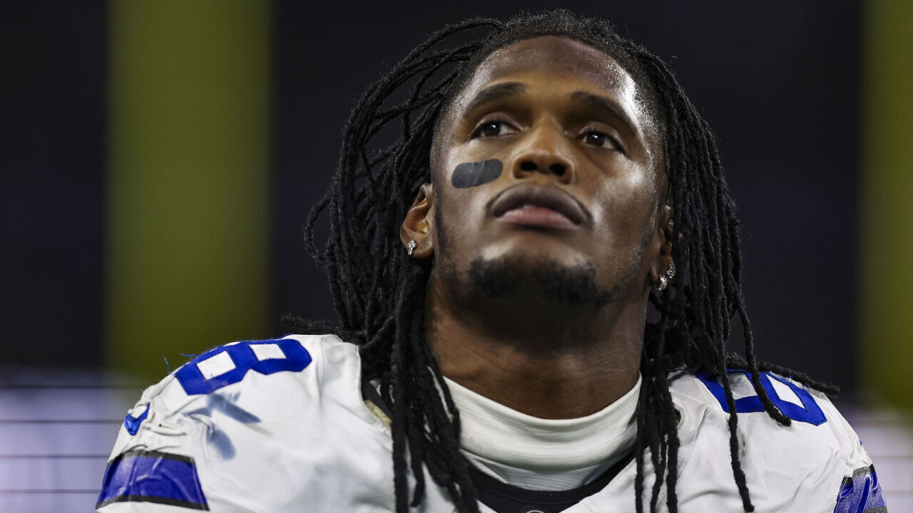 ARLINGTON, TEXAS - NOVEMBER 18: CeeDee Lamb #88 of the Dallas Cowboys looks on from the sideline during an NFL football game against the Houston Texans at AT&T Stadium on November 18, 2024 in Arlington, Texas.