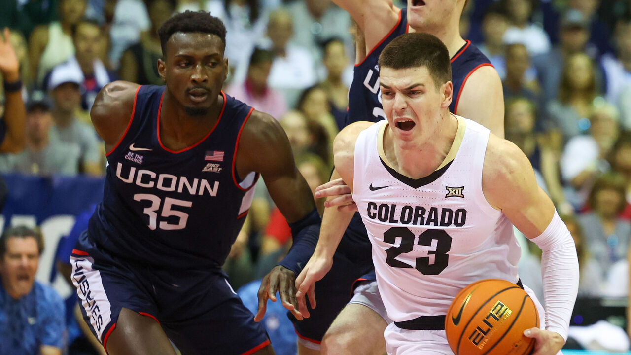 LAHAINA, HAWAII - NOVEMBER 26: Andrej Jakimovski #23 of the Colorado Buffaloes drives to the basket during the first half of the Maui Invitational against the Connecticut Huskies at the Lahaina Civic Center on November 26, 2024 in Lahaina, Hawaii.