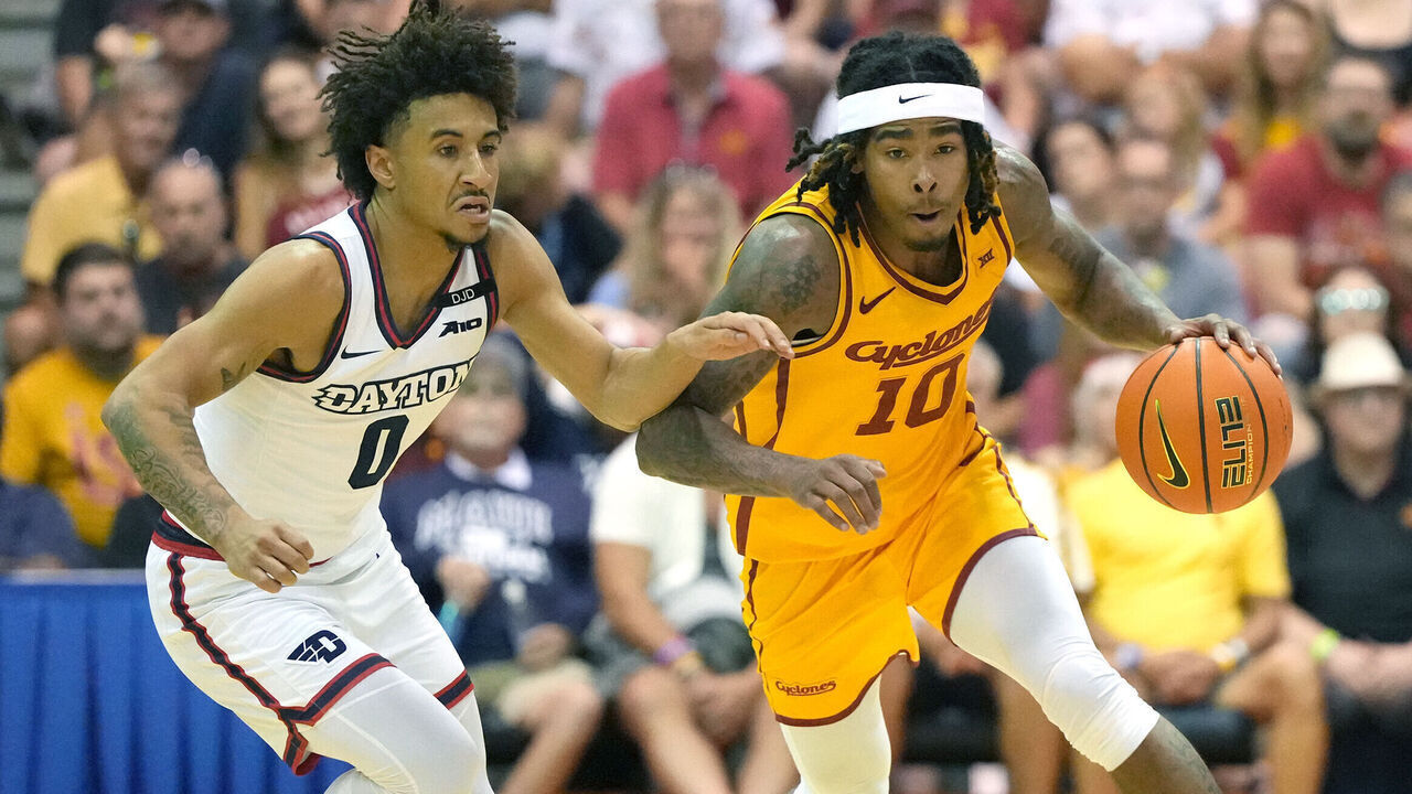 LAHAINA, HI - NOVEMBER 26: Keshon Gilbert #10 of the Iowa State Cyclones dribbles up court past Javon Bennett #0 of the Dayton Flyers in the first half during the Maui Invitational college basketball game at The Lahaina Civic Center on November 26, 2024 in Lahaina, Hawaii.