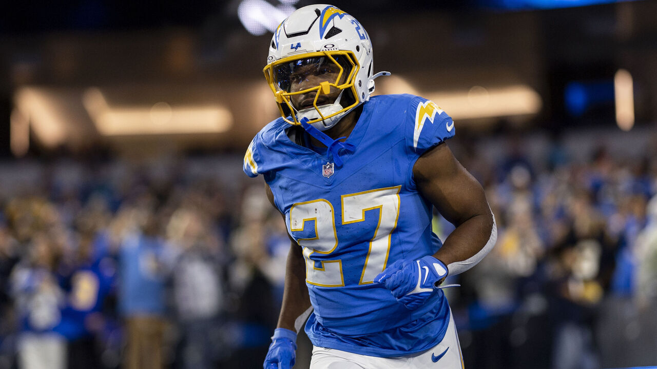 INGLEWOOD, CALIFORNIA - NOVEMBER 17: J.K. Dobbins #27 of the Los Angeles Chargers runs as he takes the field during an NFL Football game against the Cincinnati Bengals at SoFi Stadium on November 17, 2024 in Inglewood, California.