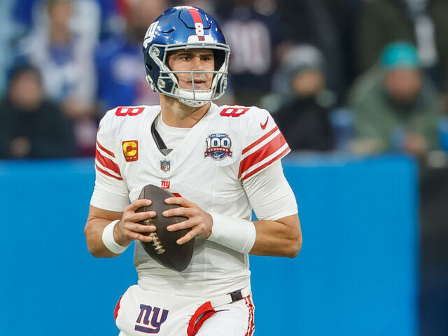 Munich, Germany - November 10: Daniel Jones of New York Giants controls the ball during the NFL Munich Game 2024 between New York Giants and Carolina Panthers at Allianz Arena on November 10, 2024 in Munich, Germany.