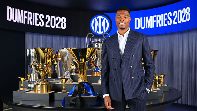 MILAN, ITALY - NOVEMBER 27: Denzel Dumfries poses as FC Internazionale extends his contract at Inter HQ on November 27, 2024 in Milan, Italy.