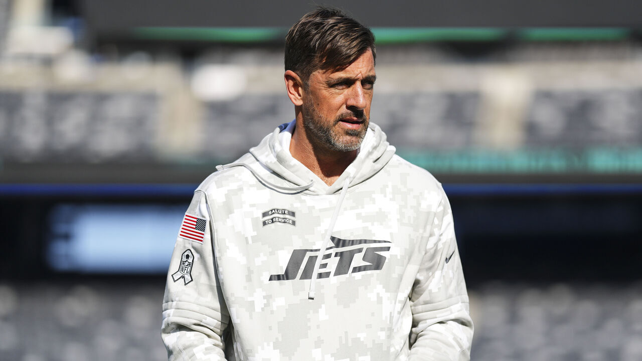 EAST RUTHERFORD, NJ - NOVEMBER 17: Aaron Rodgers #8 of the New York Jets warms up prior to an NFL football game against the Indianapolis Colts at MetLife Stadium on November 17, 2024 in East Rutherford, New Jersey.