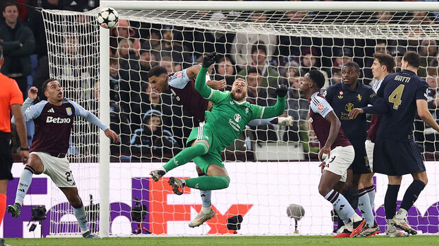 BIRMINGHAM, ENGLAND - NOVEMBER 27: Diego Carlos of Aston Villa fouls Michele Di Gregorio of Juventus, before Morgan Rogers of Aston Villa goes on to score a goal which is later ruled out following a VAR Review, during the UEFA Champions League 2024/25 League Phase MD5 match between Aston Villa FC and Juventus at Villa Park on November 27, 2024 in Birmingham, England.