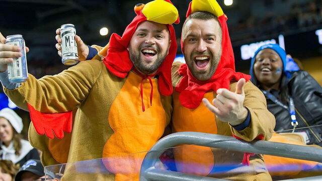 DETROIT, MI - NOVEMBER 22: Some Detroit Lions fans dressed up in their turkey outfits having fun during an NFL, Thanksgiving Day game against the Chicago Bears at Ford Field on November 22, 2018 in Detroit, Michigan. The Bears defeated the Lions 23-16.