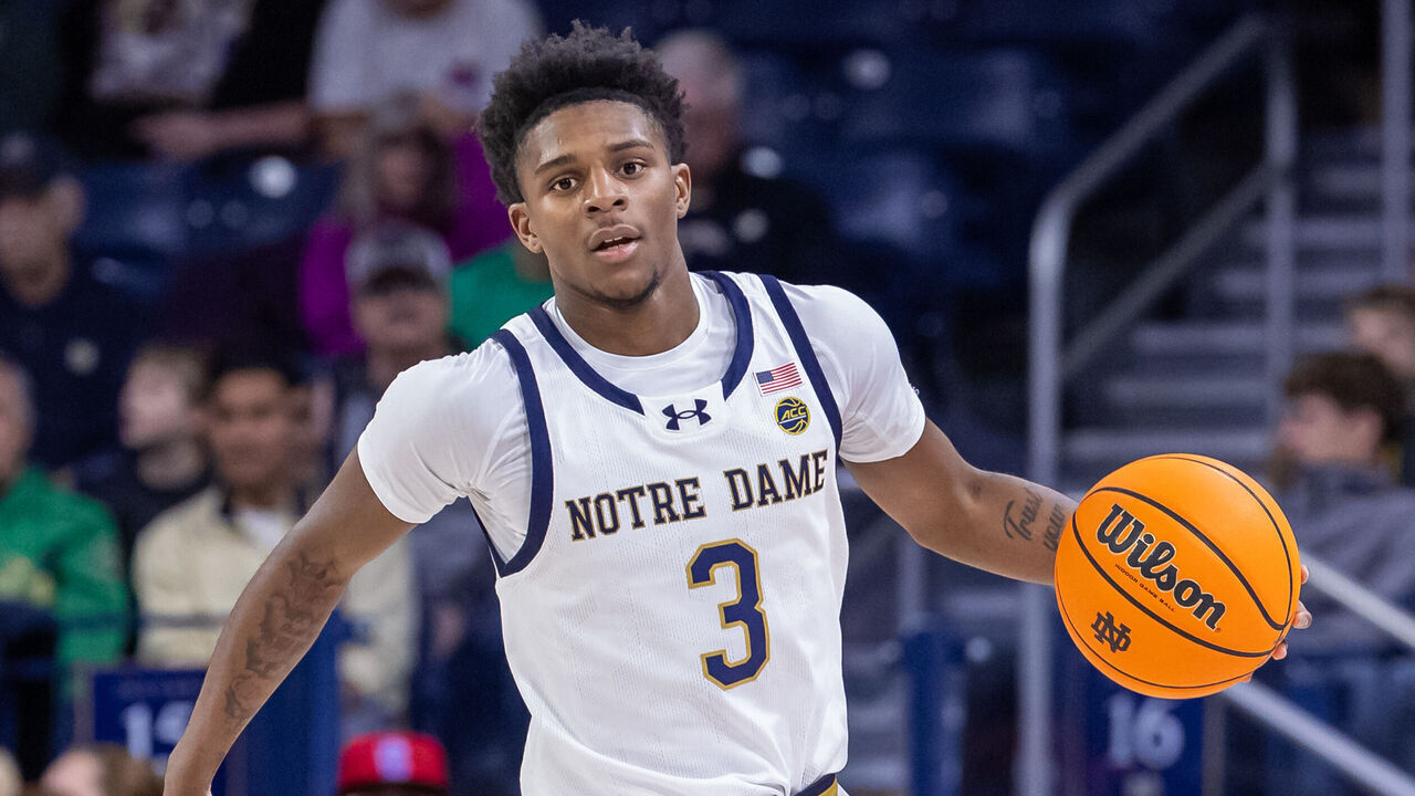 SOUTH BEND, INDIANA - NOVEMBER 19: Markus Burton #3 of the Notre Dame Fighting Irish brings the ball up court during the game against the North Dakota Fighting Hawks at Purcell Pavilion on November 19, 2024 in South Bend, Indiana.