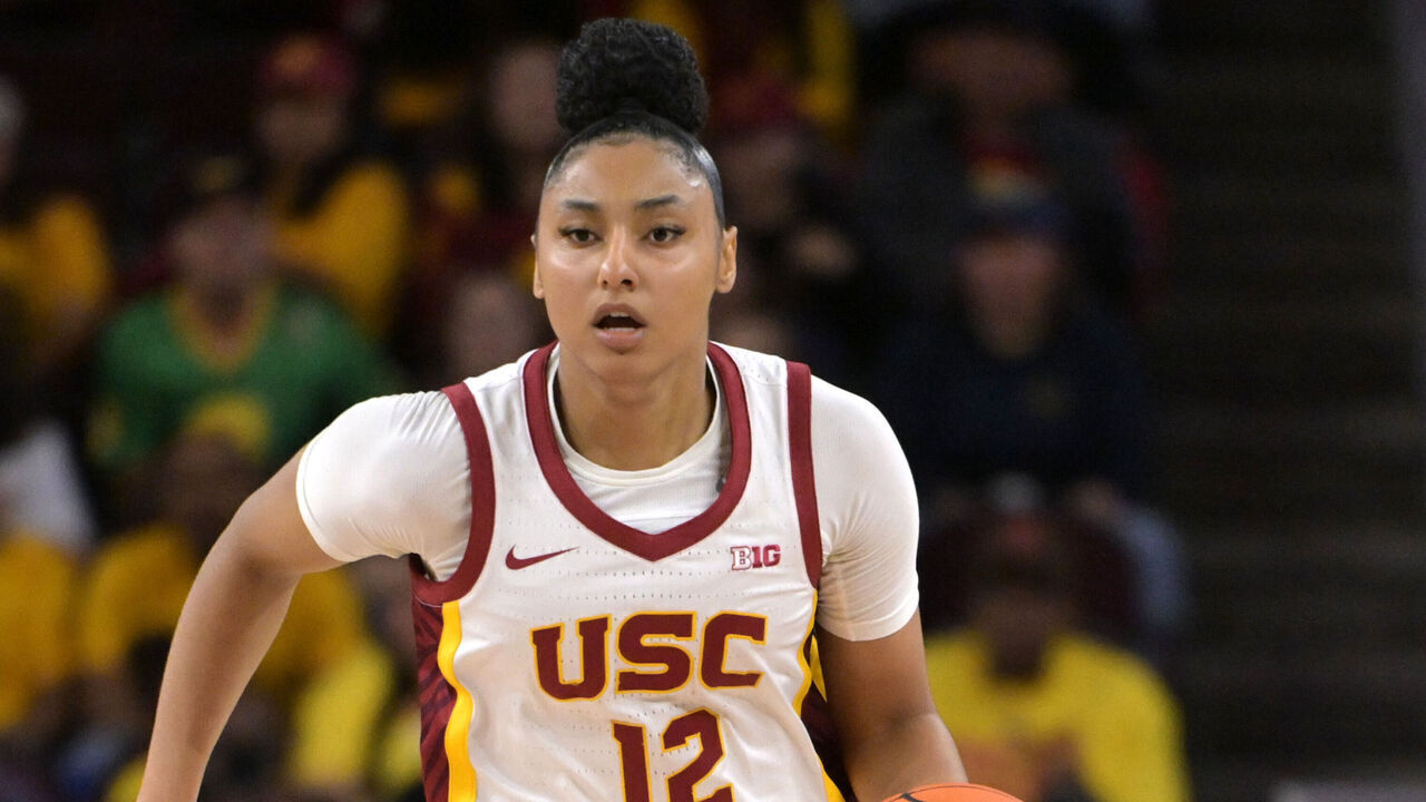 LOS ANGELES, CALIFORNIA - NOVEMBER 23: JuJu Watkins #12 of the USC Trojans handles the ball against the Notre Dame Fighting Irish at Galen Center on November 23, 2024 in Los Angeles, California.