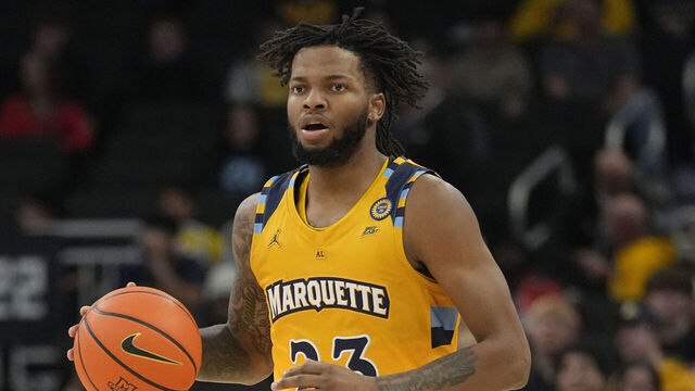 MILWAUKEE, WISCONSIN - NOVEMBER 27: David Joplin #23 of the Marquette Golden Eagles dribbles the ball against the Stonehill Skyhawks during the first half at Fiserv Forum on November 27, 2024 in Milwaukee, Wisconsin.