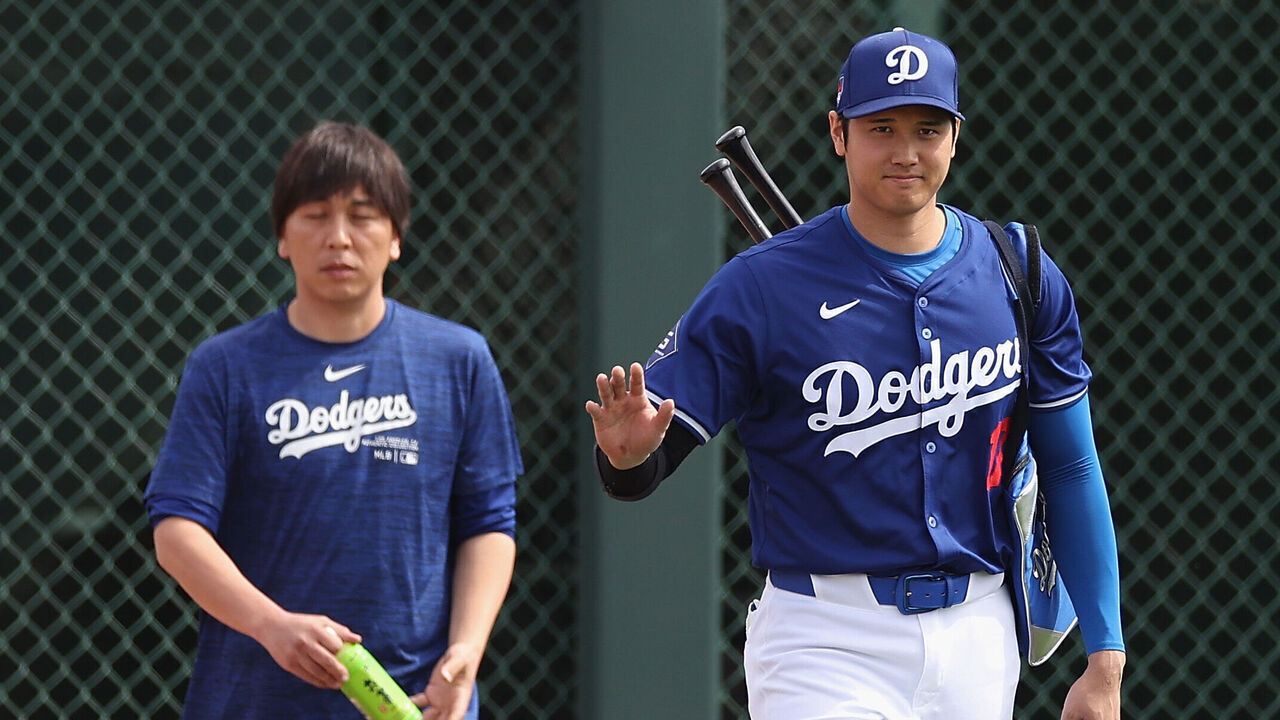 GLENDALE, ARIZONA - FEBRUARY 27: Shohei Ohtani #17 of the Los Angeles Dodgers and interpreter Ippei Mizuhara arrive to a game against the Chicago White Sox at Camelback Ranch on February 27, 2024 in Glendale, Arizona.